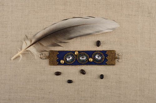 Handmade beaded dark blue bracelet with crystal charms and gold beads - MADEheart.com