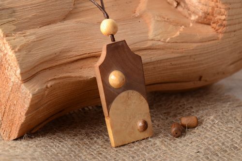 Laconic handmade two colored carved wooden neck pendant on cord for women - MADEheart.com