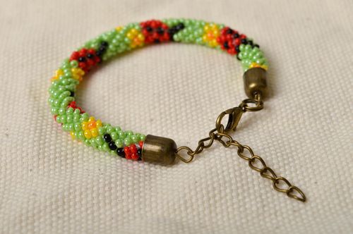 Handmade beaded cord adjustable bracelet in light green, red and black color - MADEheart.com