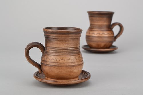4 oz clay glazed drinking cup in pitcher shape with handle and rustic pattern - MADEheart.com