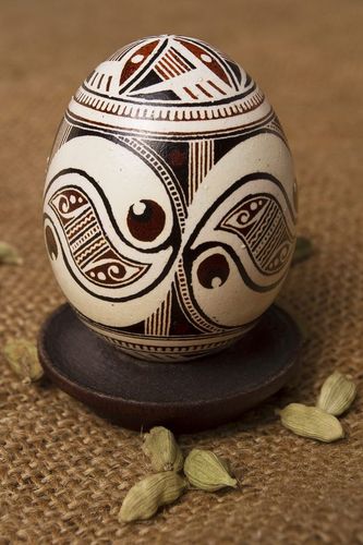 Painted egg with white and brown ornaments pysanka - MADEheart.com