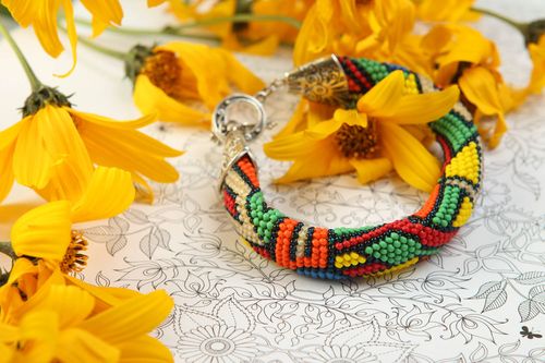 Handmade beaded cord bracelet in geometric style and metal fittings - MADEheart.com