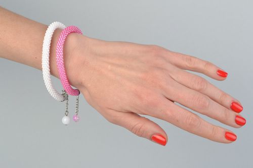 Set of 2 handmade beaded cord womens wrist bracelets in pink and white colors - MADEheart.com