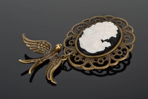 Vintage metal brooch with cameo and swallow - MADEheart.com