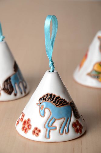 Handmade small decorative bell molded of pottery clay with blue painted horse - MADEheart.com