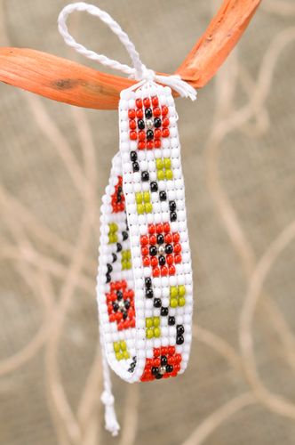 Handmade ethnic wrist bracelet woven of beads in white and red colors for women - MADEheart.com