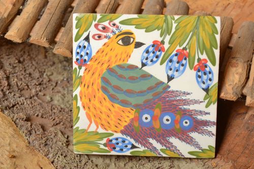 Handmade designer ceramic facing tile with colorful bird painted with engobes - MADEheart.com