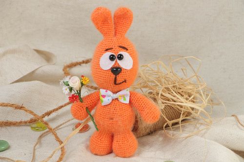 Handmade soft toy crocheted of acrylic threads Orange Rabbit with bouquet - MADEheart.com
