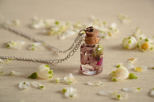 Handmade transparent neck pendant with real flowers inside coated with epoxy - MADEheart.com
