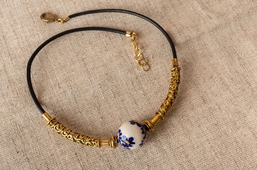 Handmade necklace choker made of brass with porcelain bead on leather lace - MADEheart.com