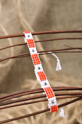 Handmade woven womens thin beaded wrist bracelet of red and white colors - MADEheart.com
