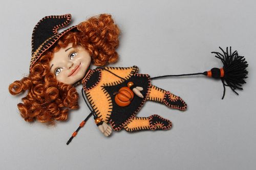 Felt brooch in the shape of doll witch - MADEheart.com