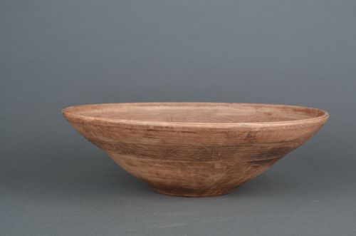 Clay bowl made using milk firing technique - MADEheart.com
