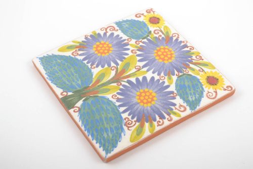Handmade decorative ceramic tile with floral ornament painted with engobes - MADEheart.com