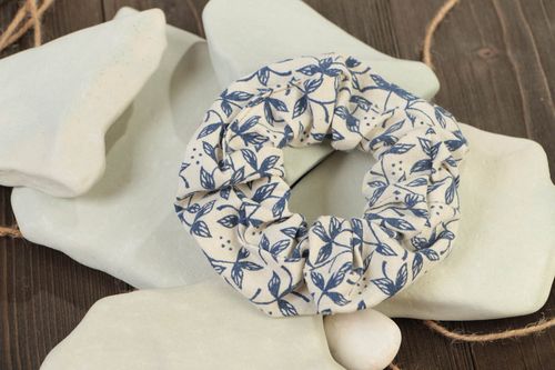 Decorative handmade hair tie sewn of white fabric with blue floral pattern - MADEheart.com