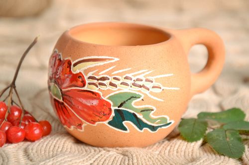 Clay teacup in yellow color with handle and poppy pattern - MADEheart.com