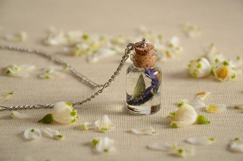 Handmade epoxy resin pendant with real flowers inside in the shape of vial - MADEheart.com