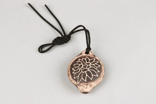 Tin whistle pendant made of clay with carving - MADEheart.com