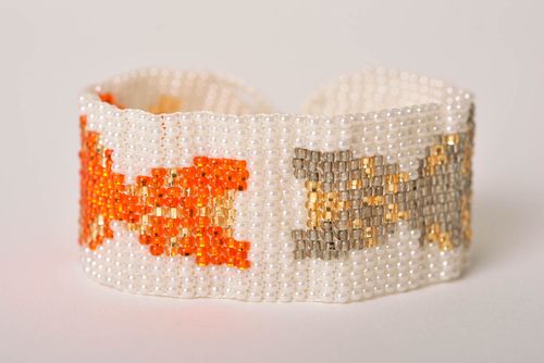 Wide handmade beaded bracelet with puppy shape ornament for women - MADEheart.com
