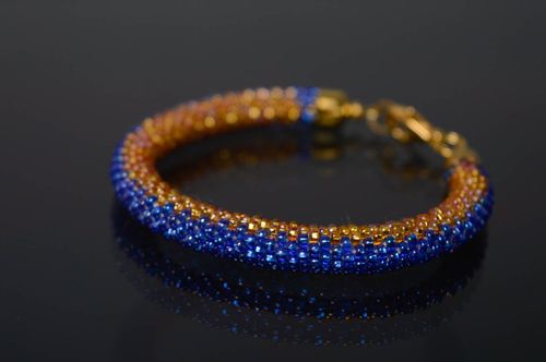 Handmade blue and gold color beads adjustable cord bracelet for women - MADEheart.com