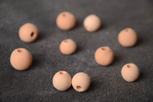 Set of 10 small handmade beige ceramic beads with smooth surface - MADEheart.com