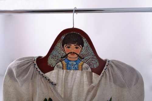 Handmade massive clothes hanger cut out of wood and painted with acrylics  - MADEheart.com
