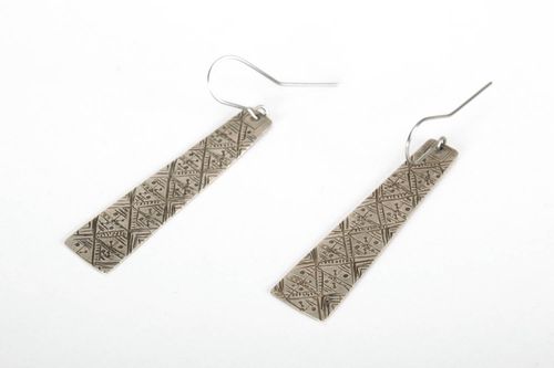 Earrings made using technique of stamping on melchior - MADEheart.com