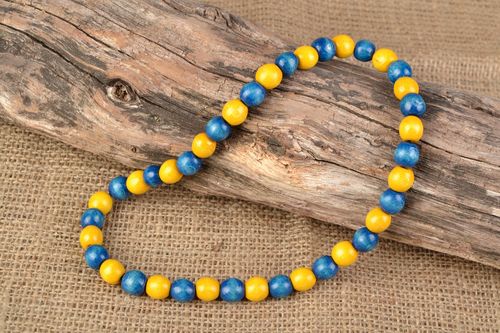 Unusual bright beautiful wooden bead necklace - MADEheart.com