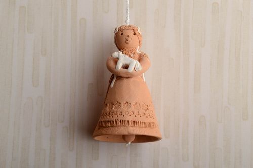 Figured clay bell with ornament - MADEheart.com