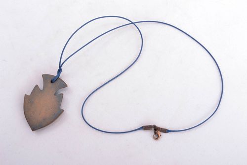 Ceramic pendant in the shape of a fish - MADEheart.com