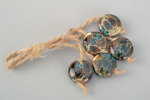 Flat glass beads made using lampwork technique - MADEheart.com