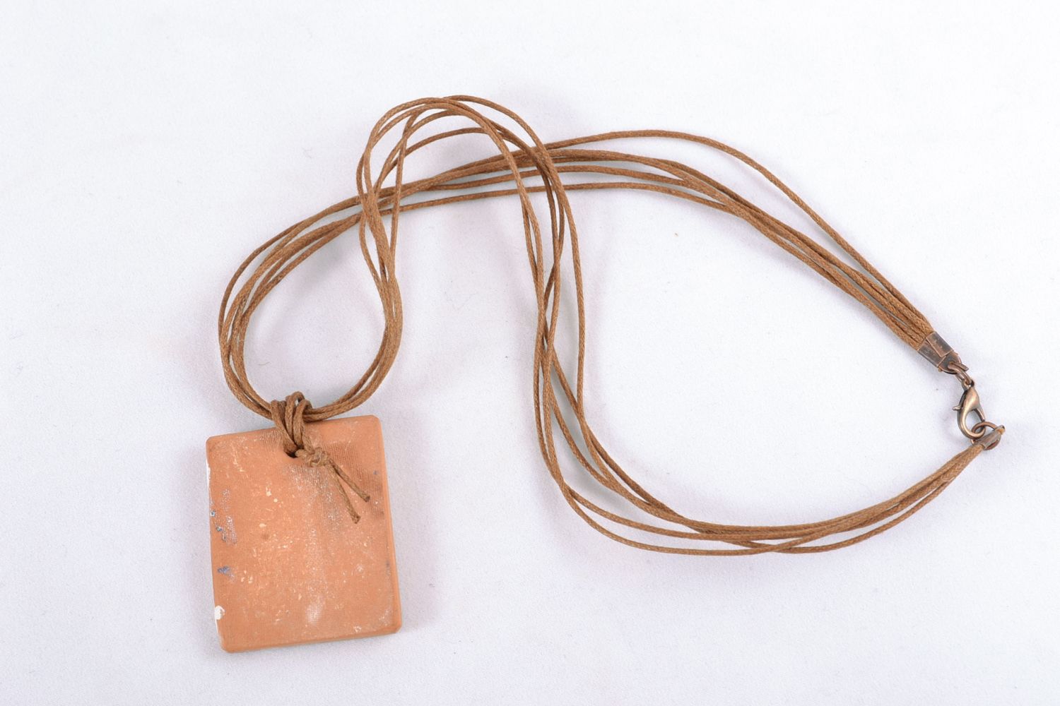 Rectangular ceramic pendant with cord photo 4