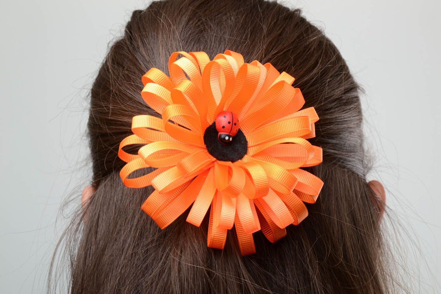 Handmade decorative orange elastic hair band with large volume rep ribbon flower photo 5