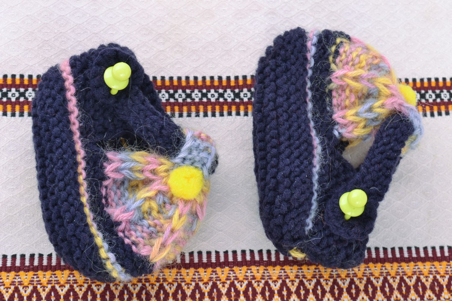 Hand knitted wool baby bootees of blue color photo 1