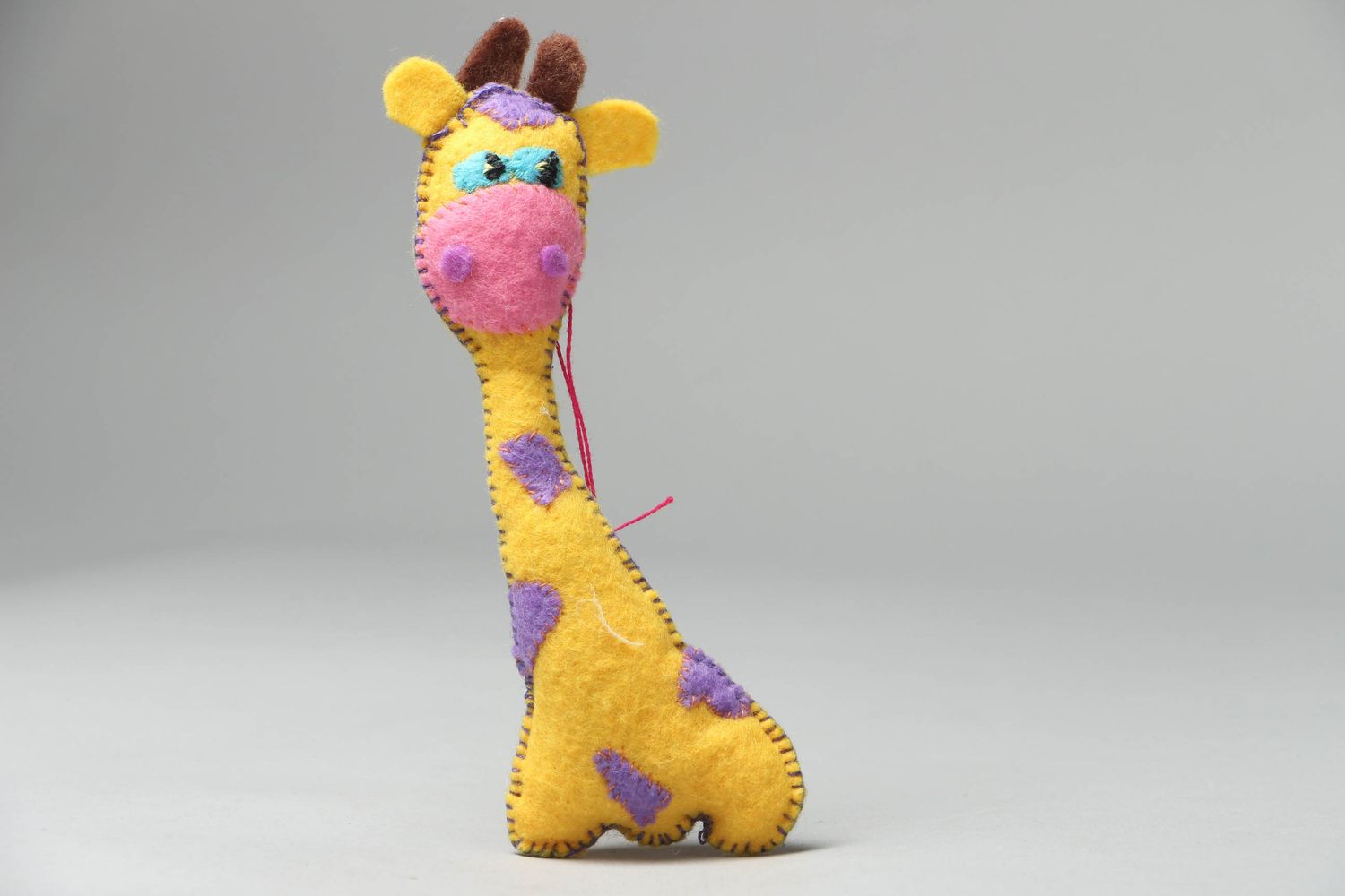Игрушка из фетра маленькая жираф  фото 1