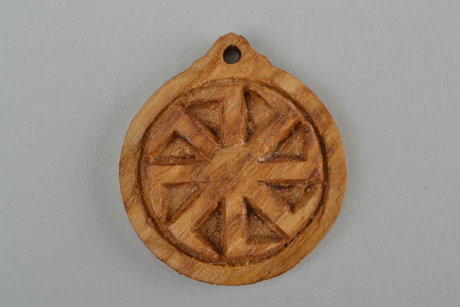 Handmade carved small round wooden neck pendant with Slavic symbol Kolovrat photo 3