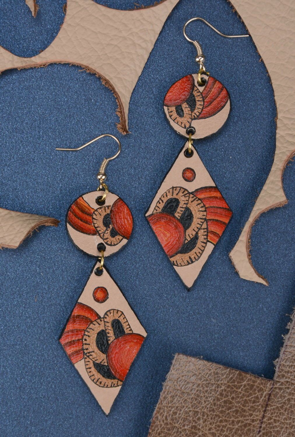 Beautiful earrings made of leather photo 2