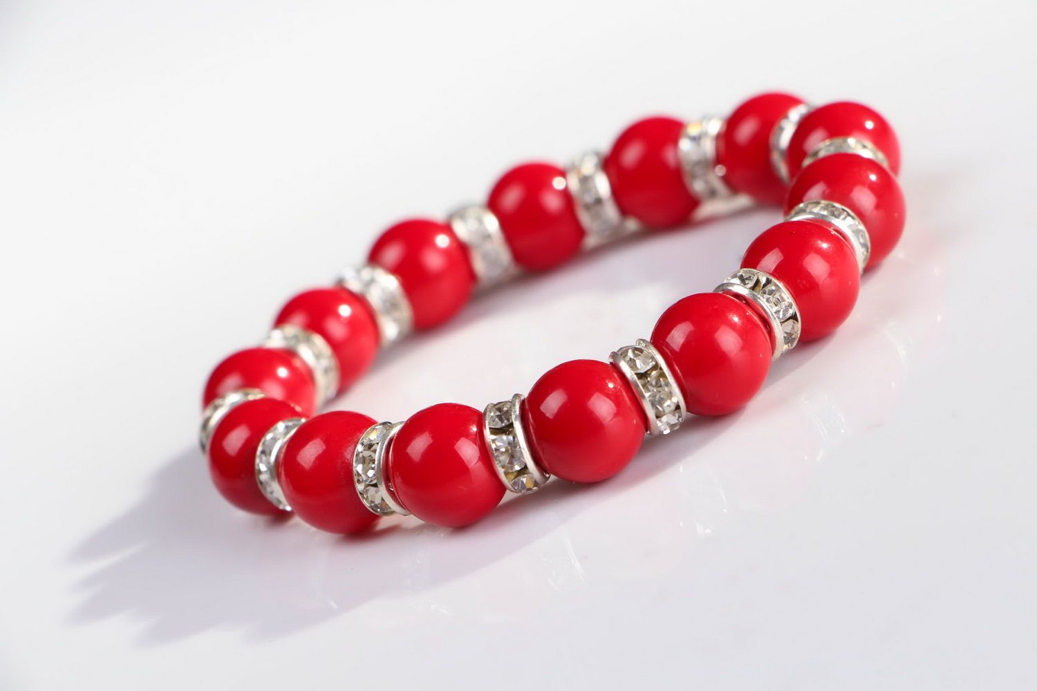 Bracelet made of natural coral on elastic band photo 4