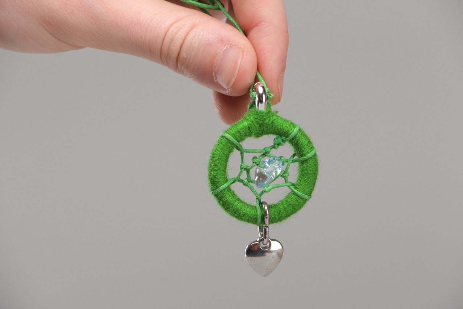 Handmade ethnic dreamcatcher pendant necklace of green color on cord for women photo 4