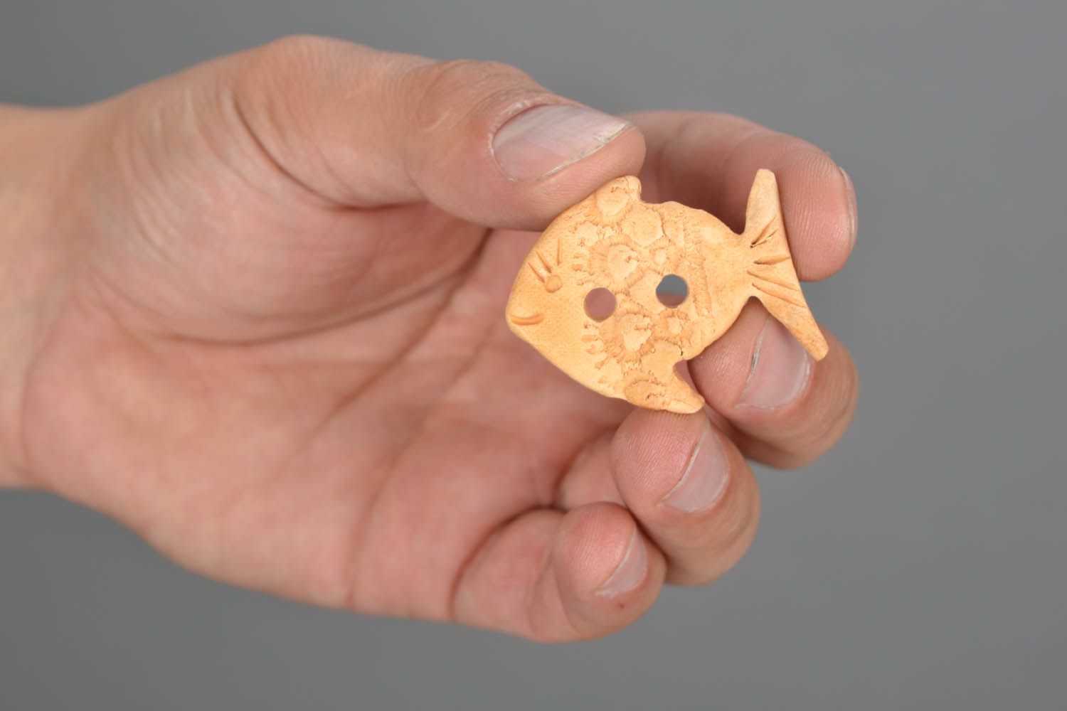 Handmade clay button in the shape of fish photo 3