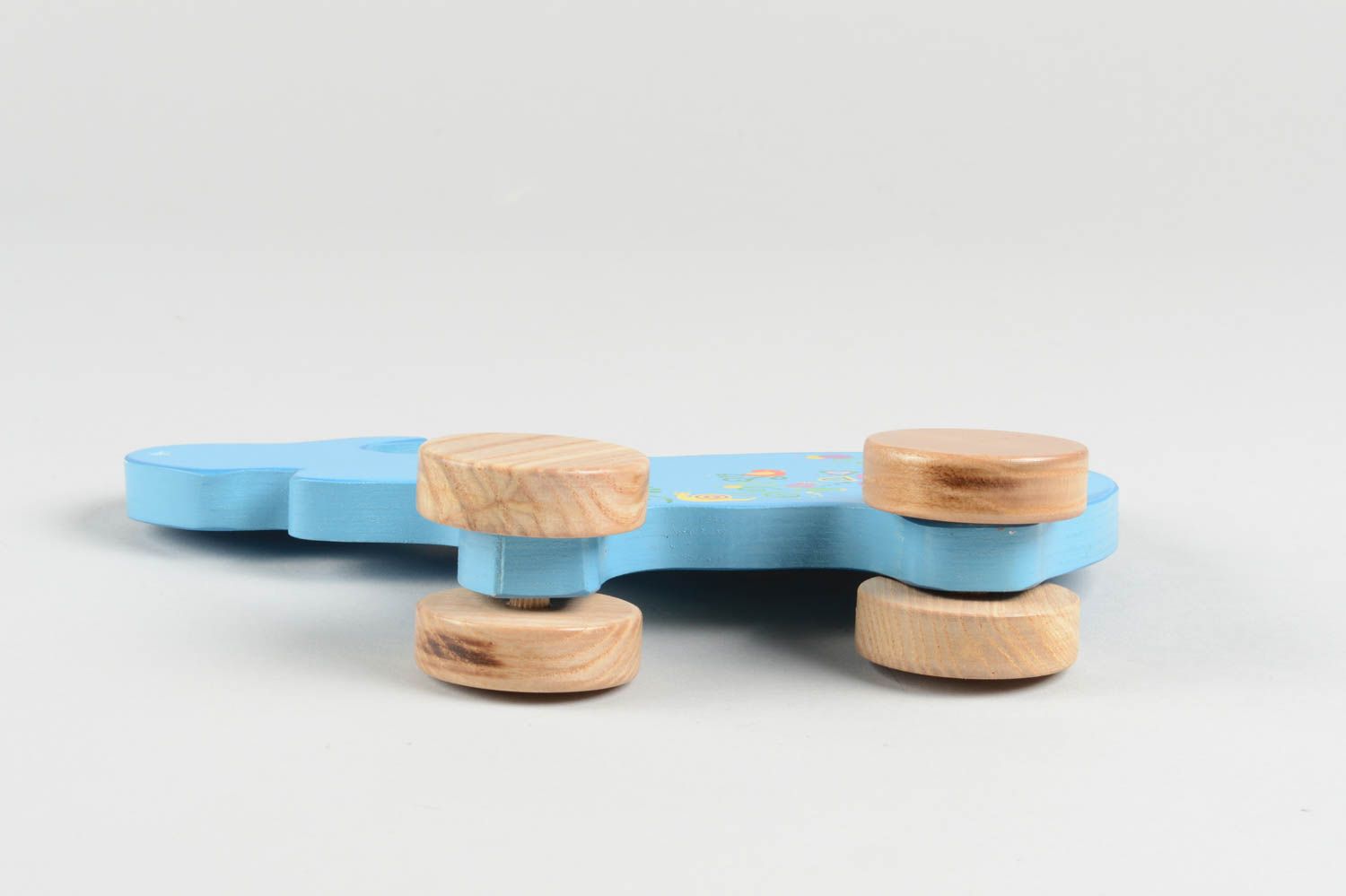 Игрушка ручной работы игрушка из дерева голубой носорог игрушка-каталка фото 5