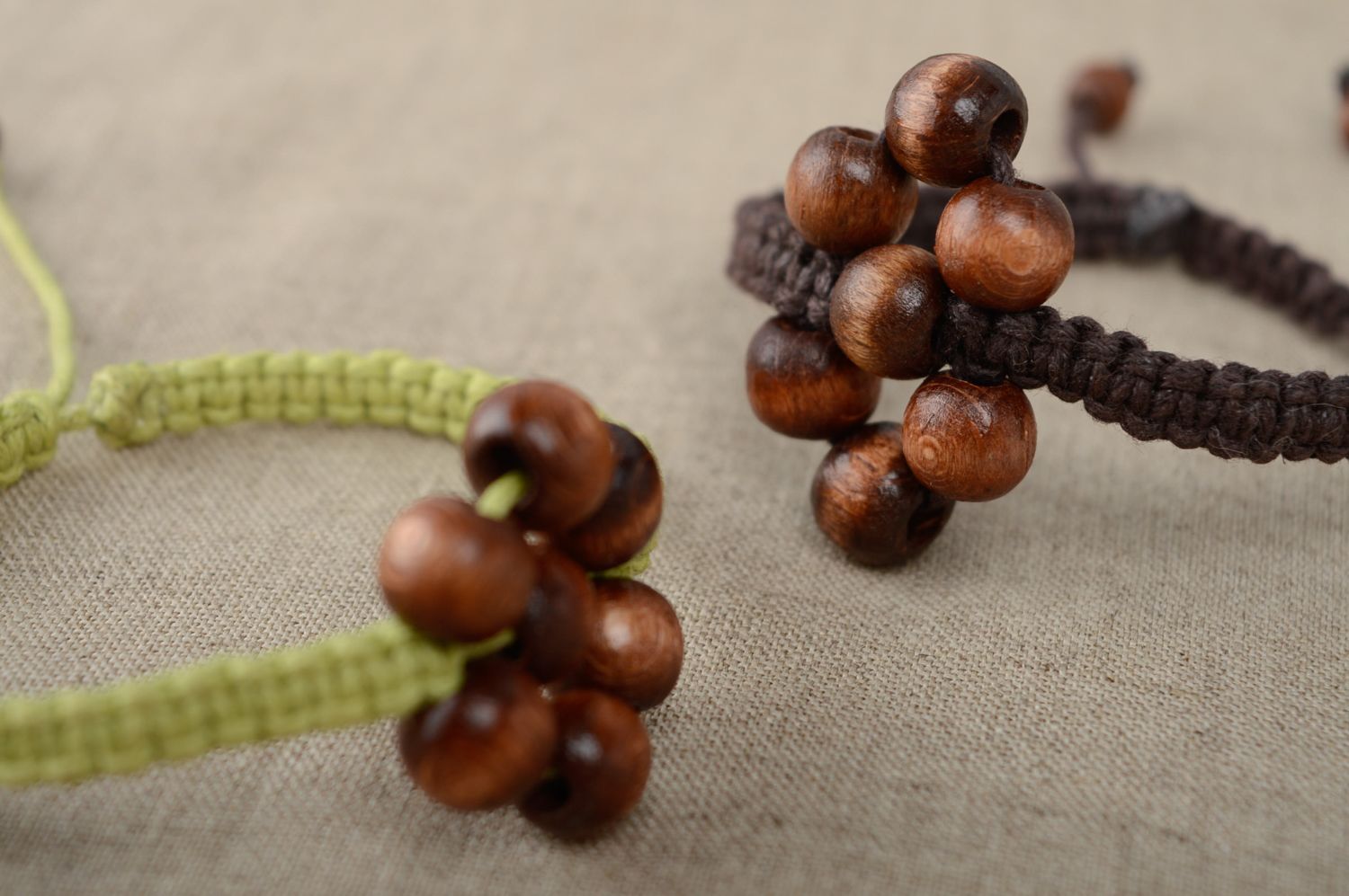 Unusual macrame bracelet of brown color with wooden beads photo 5