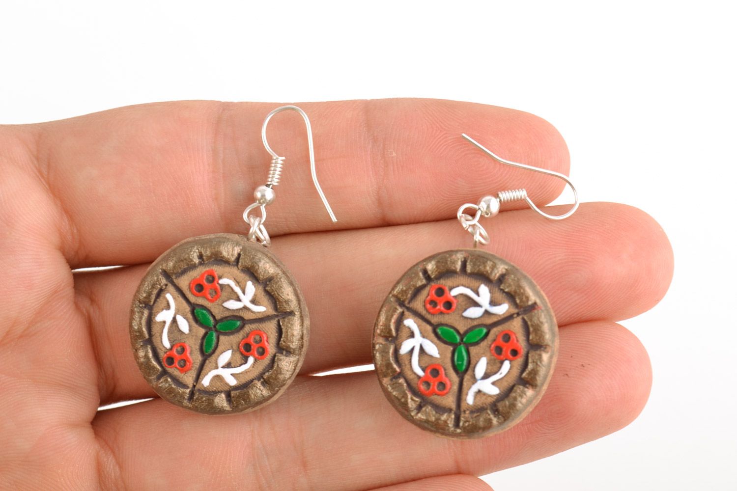 Handmade round ceramic dangling earrings with flowers painted with acrylics photo 2