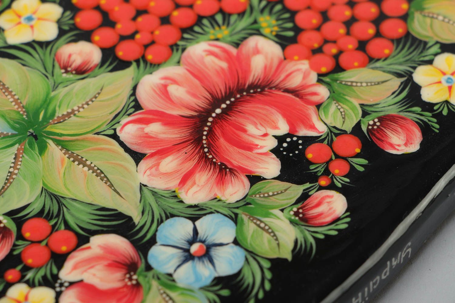 Handmade pear-shaped black wooden cutting board painted in ethnic style  photo 3