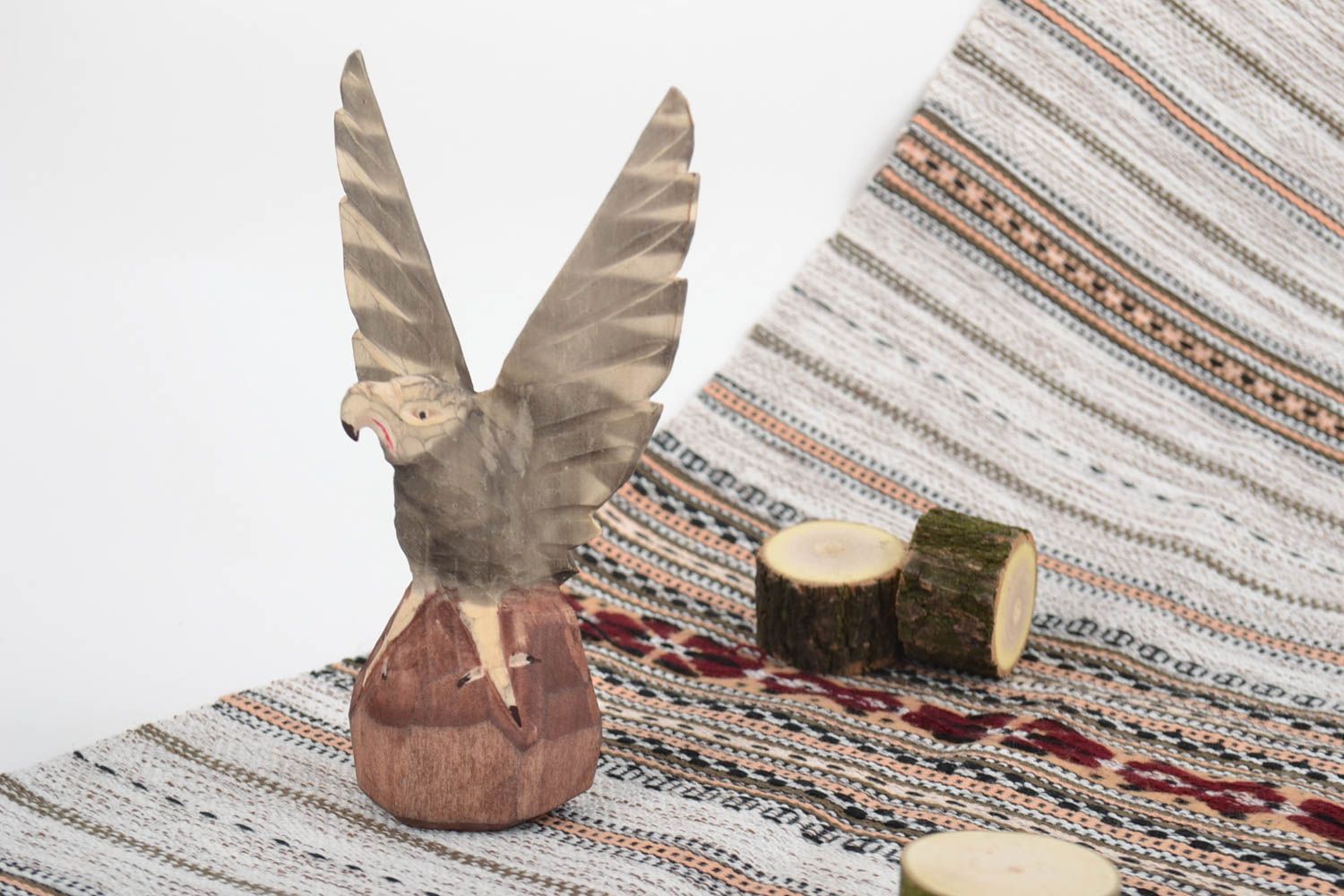 Handmade beautiful carved natural wooden statuette of eagle for table decoration photo 1