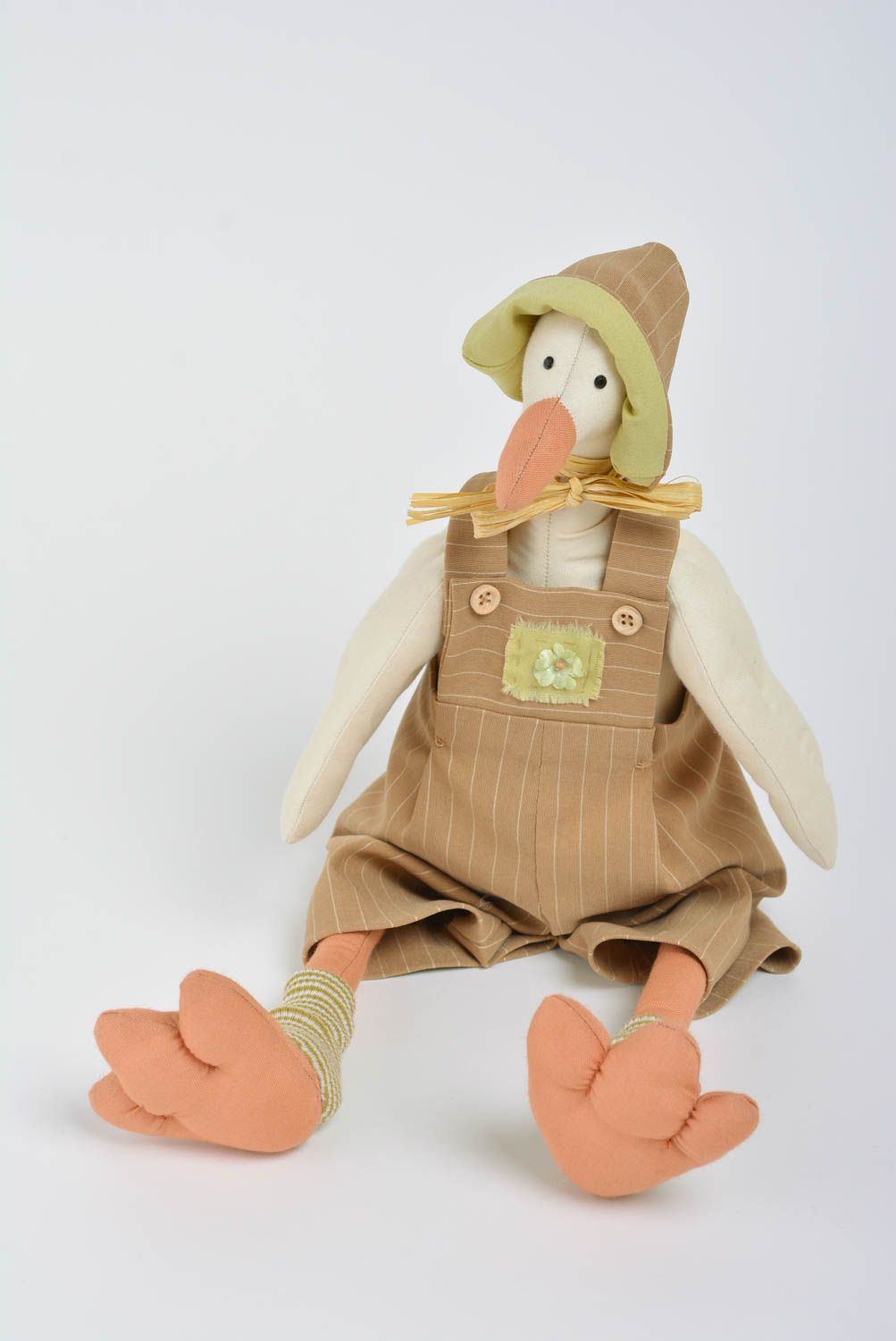 Handmade designer interior fabric soft toy Goose in brown clothes with straw bow photo 1