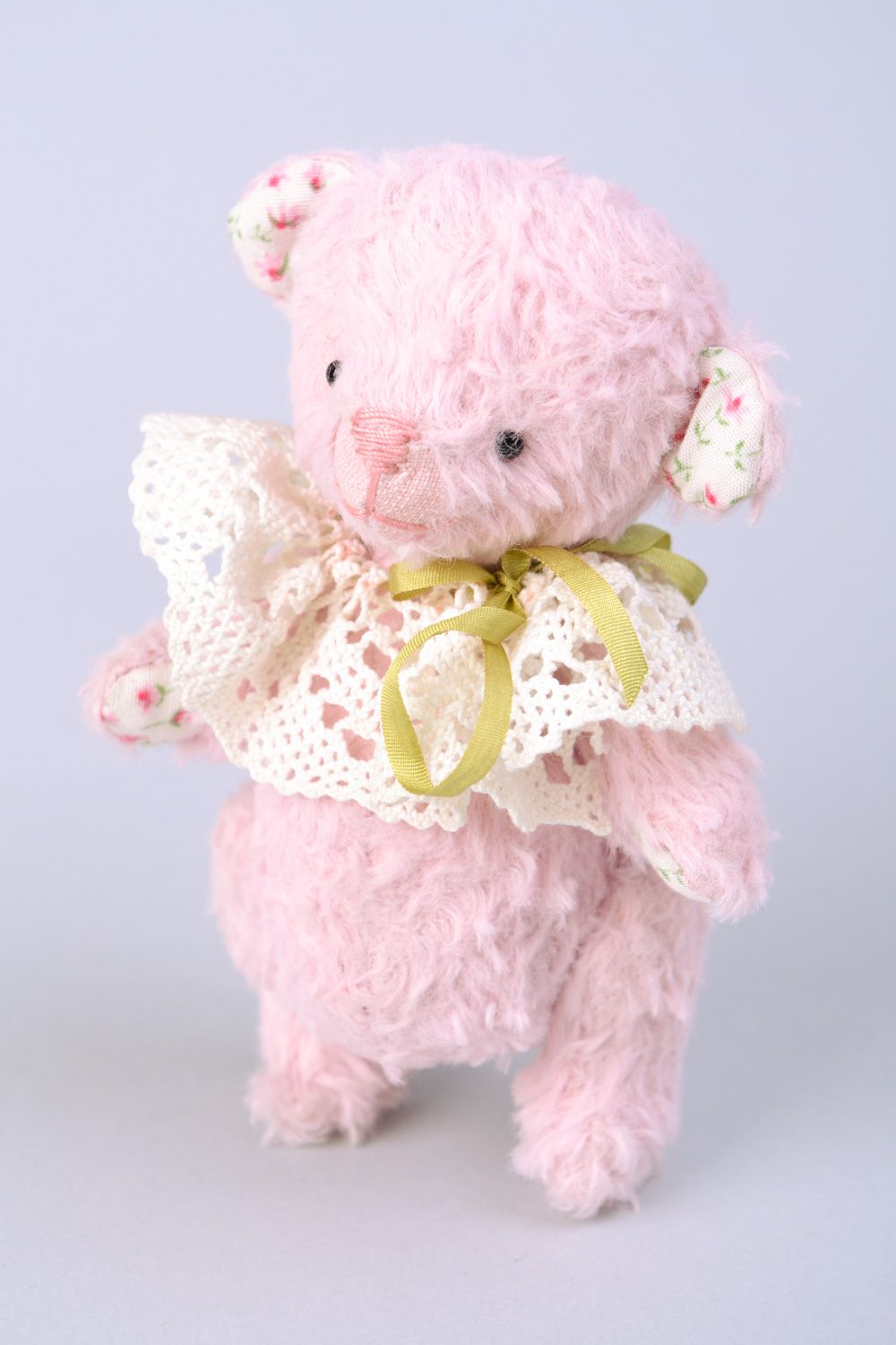 Handmade designer soft toy bear sewn of fabric of pink color with lacy collar  photo 4