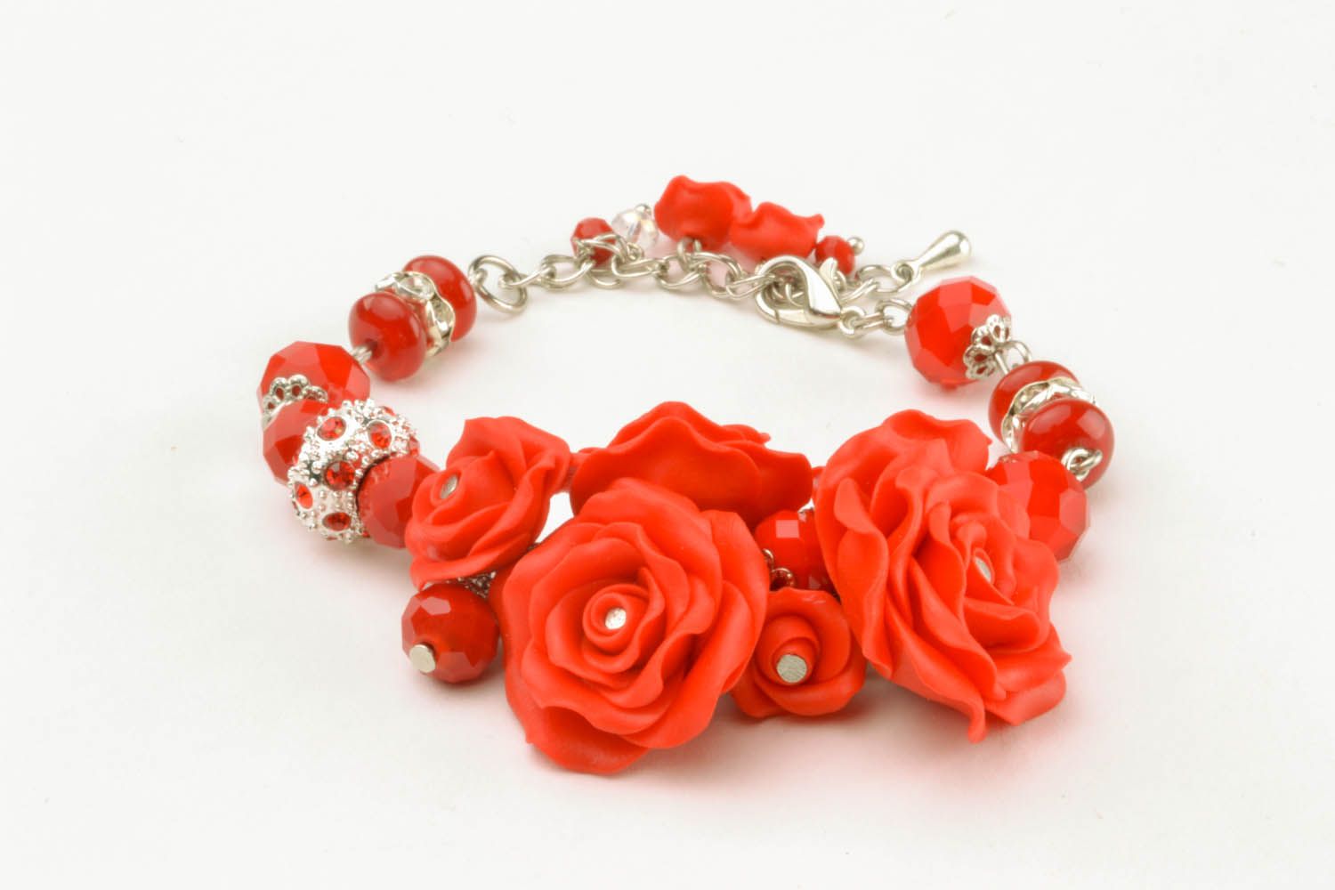 Bracelete artesanal Rosas vermelhas de argila de polímero foto 1