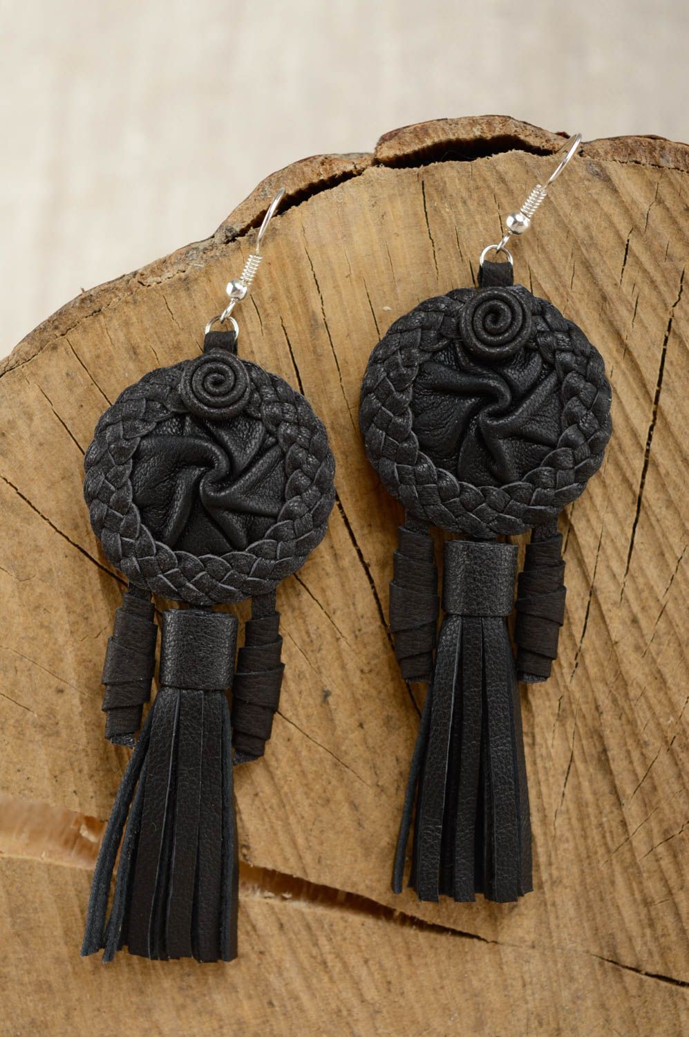Leather earrings made using weaving and applique work techniques photo 1
