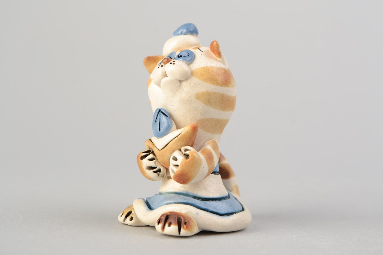 Handmade designer small ceramic figurine of coquettish kitten painted with glaze photo 1